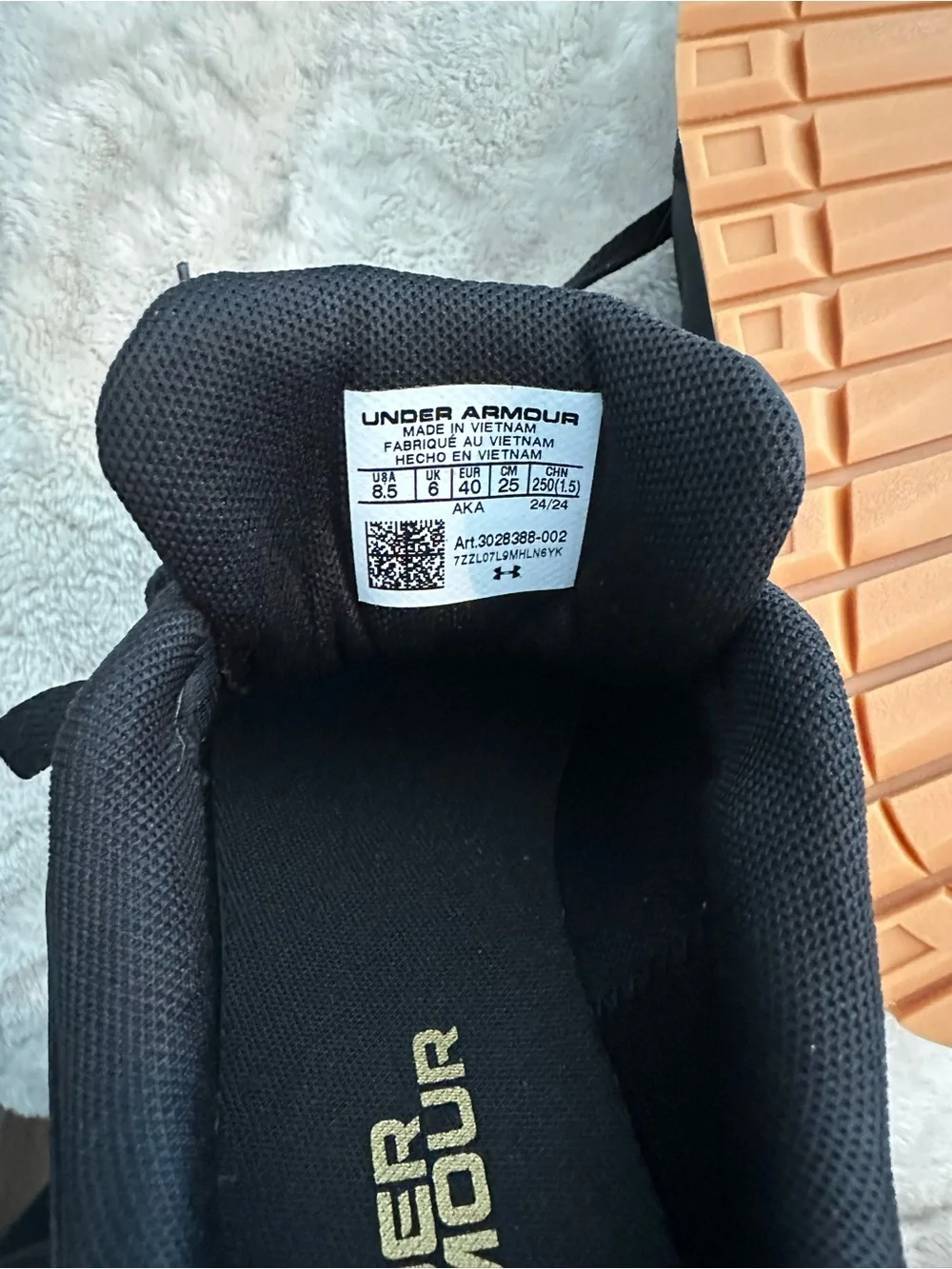 Under Armour Women’s Black Athletic Sneakers with Gold Logo